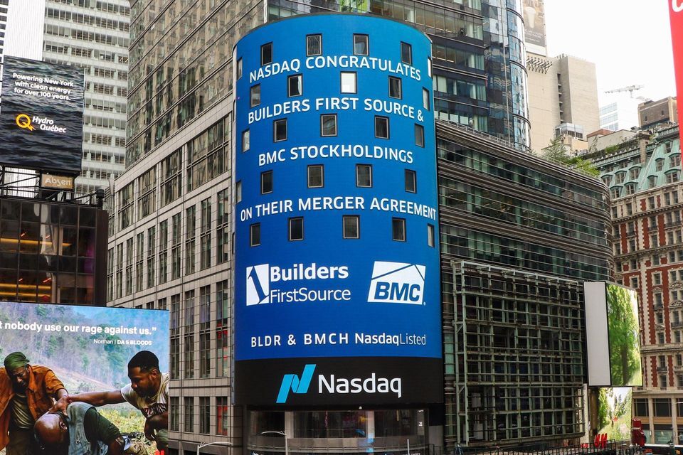 NASDAQ Reader Board Announcing Builders FirstSource-BMC Merger